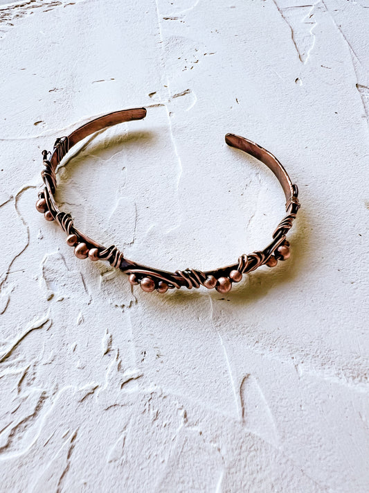 Bangle with Wave Motif and Copper Beads