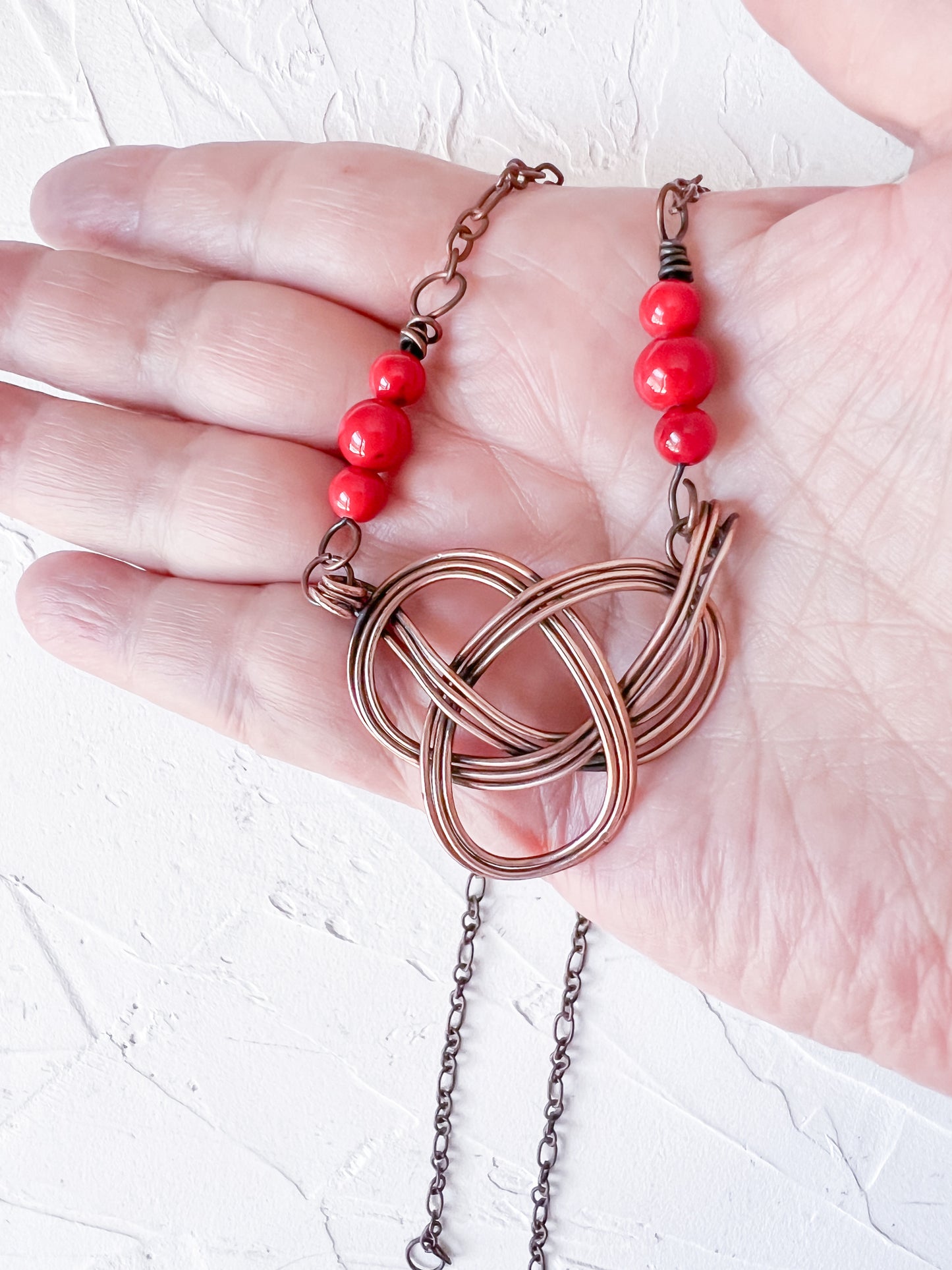 Celtic Knot in Copper with Red Jade Accent Beads