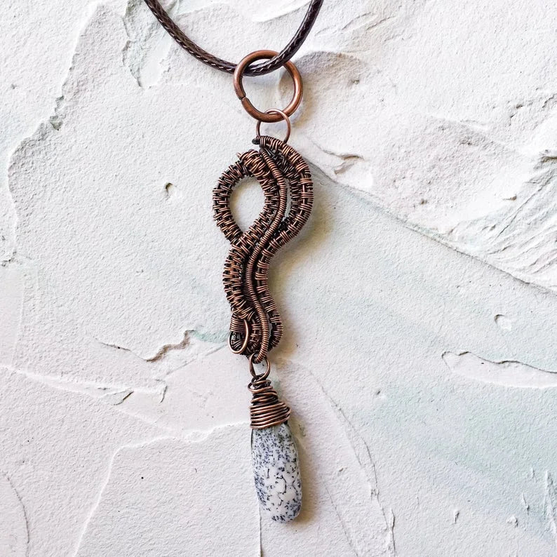 Copper Wire Woven Pendant Hand Made with a dendrite faceted bead