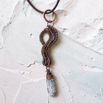 Copper Wire Woven Pendant Hand Made with a dendrite faceted bead