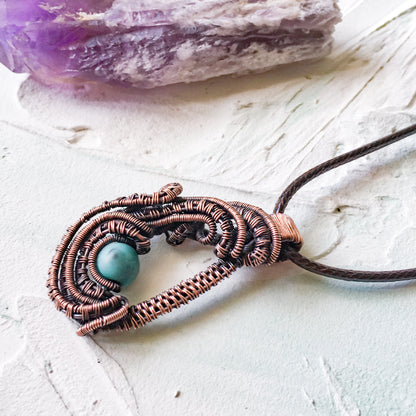 Copper Wire Woven Pendant Hand Made with a howlite turquoise bead