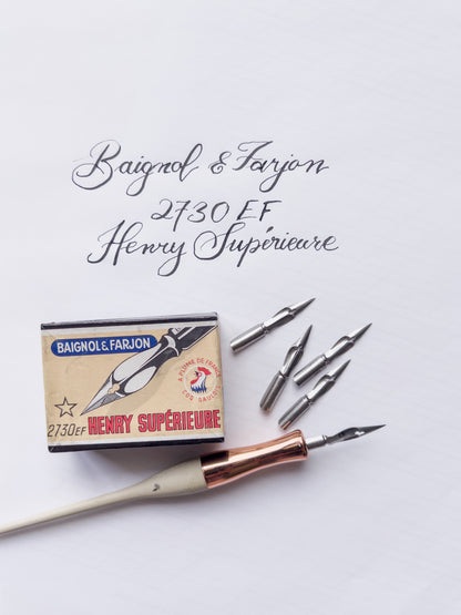 Baigmore & Farjon calligraphy set with pen and nibs on a white background