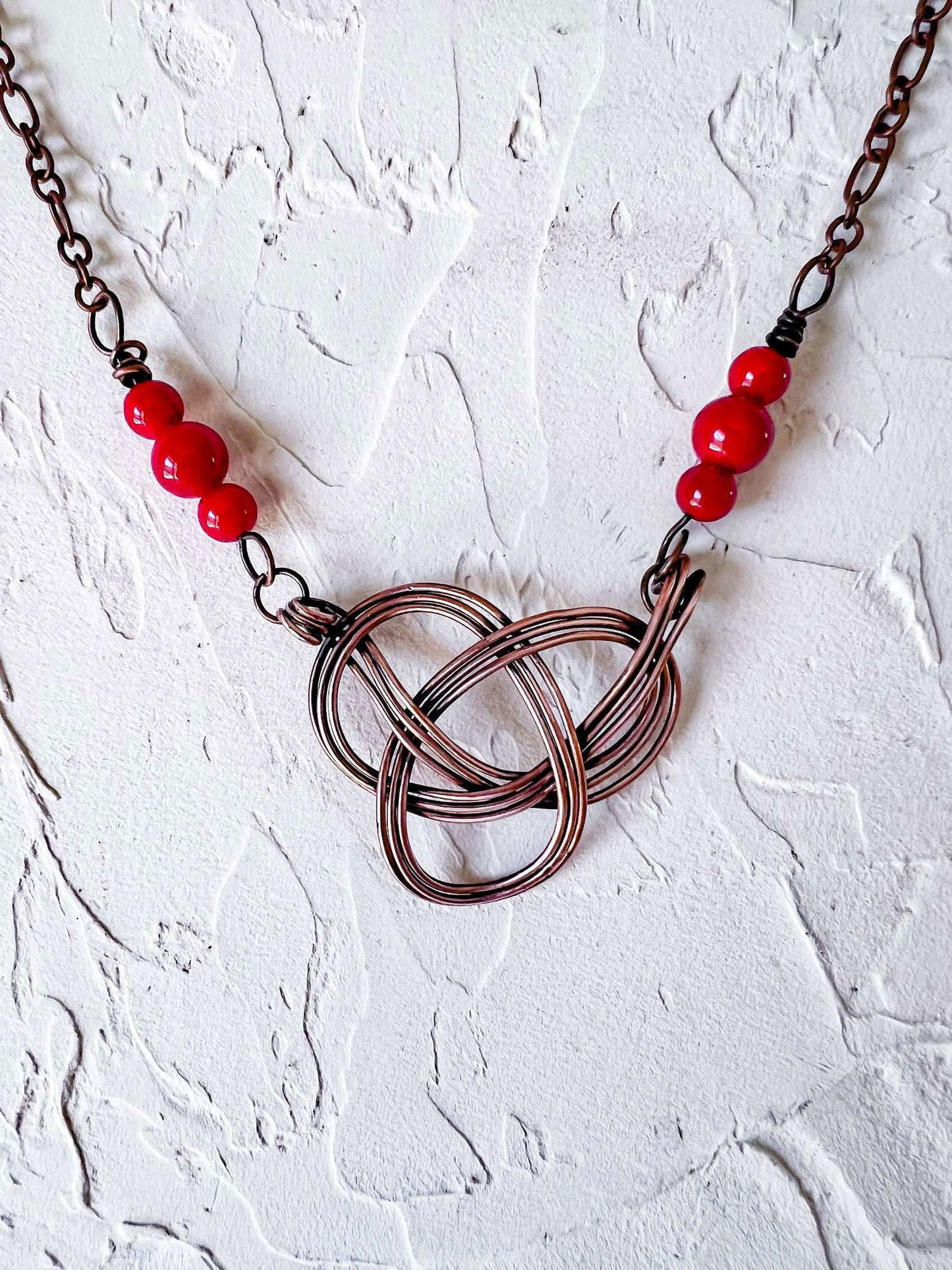 Celtic Knot in Copper with Red Jade Accent Beads - Copper Jewels