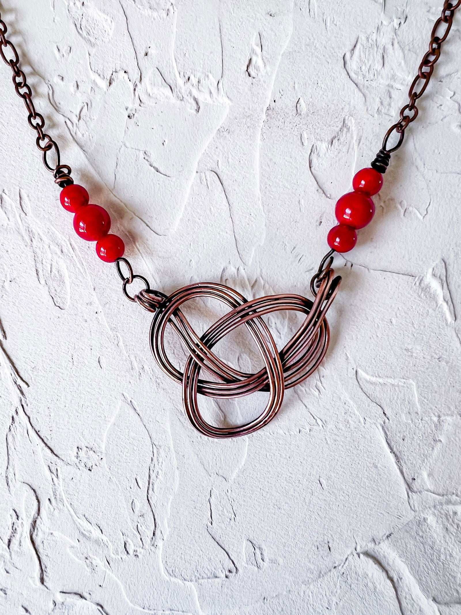 Celtic Knot in Copper with Red Jade Accent Beads - Copper Jewels