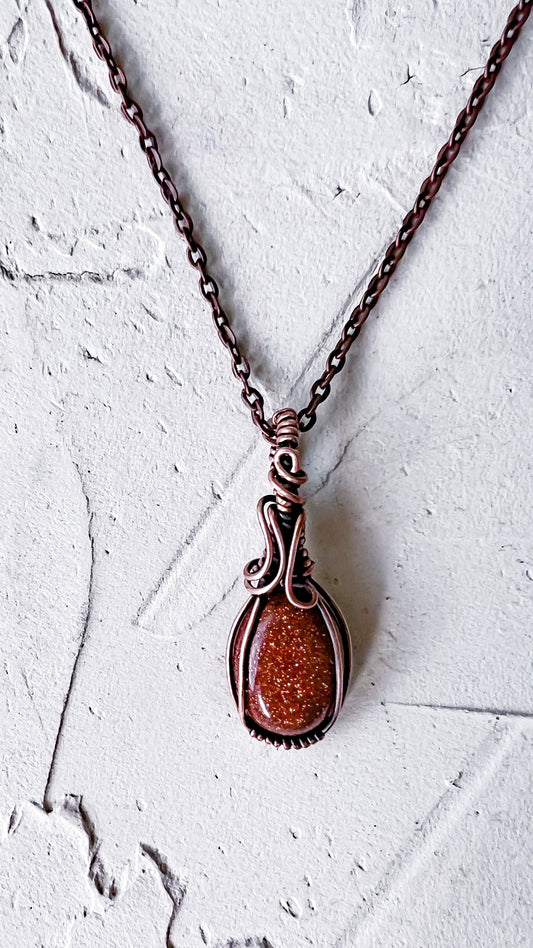 Golden Whisper – Copper and Goldstone Pendant