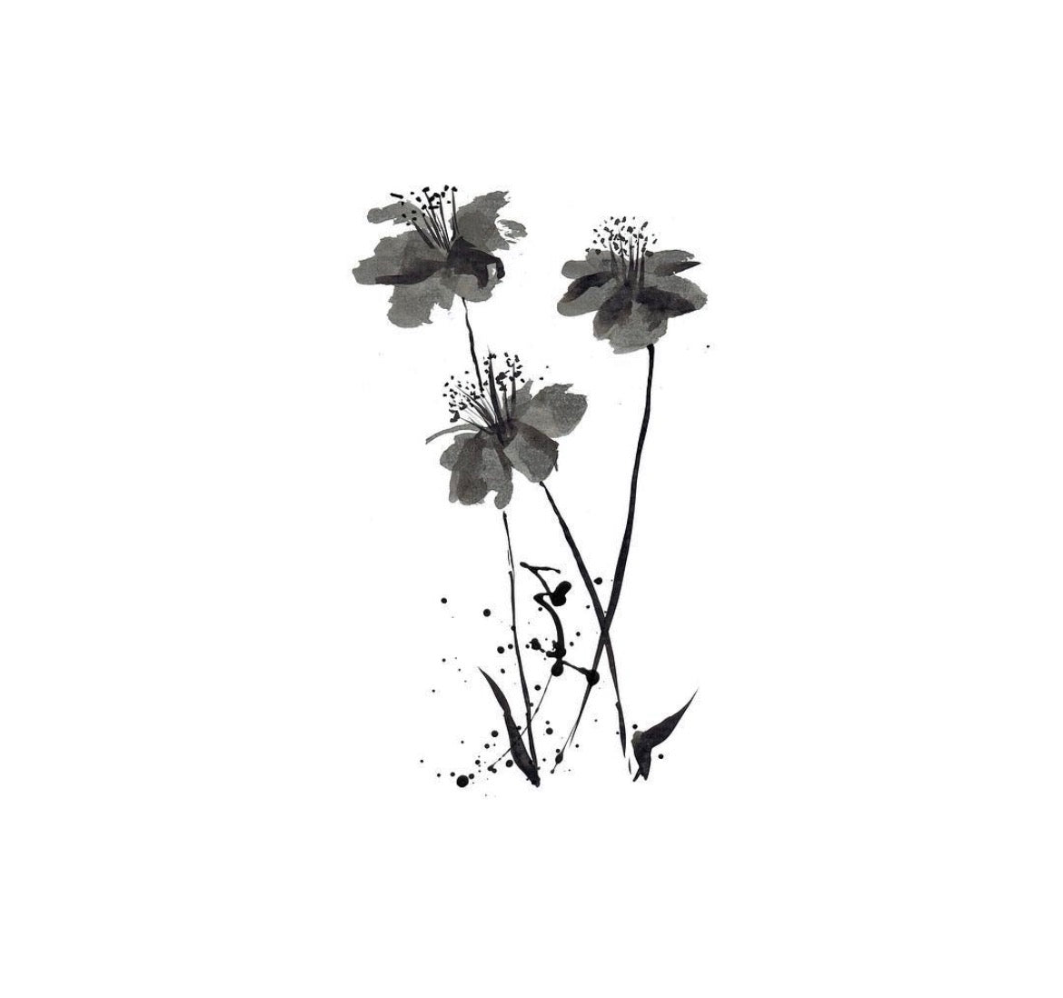Black floral tattoo design on a white background